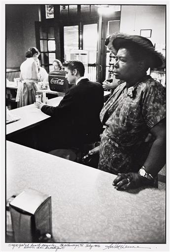 ALFRED WERTHEIMER (1929-2014) Segregated lunch counter, Chattanooga, TN, Elvis has breakfast. July 1956; printed 1987.                           